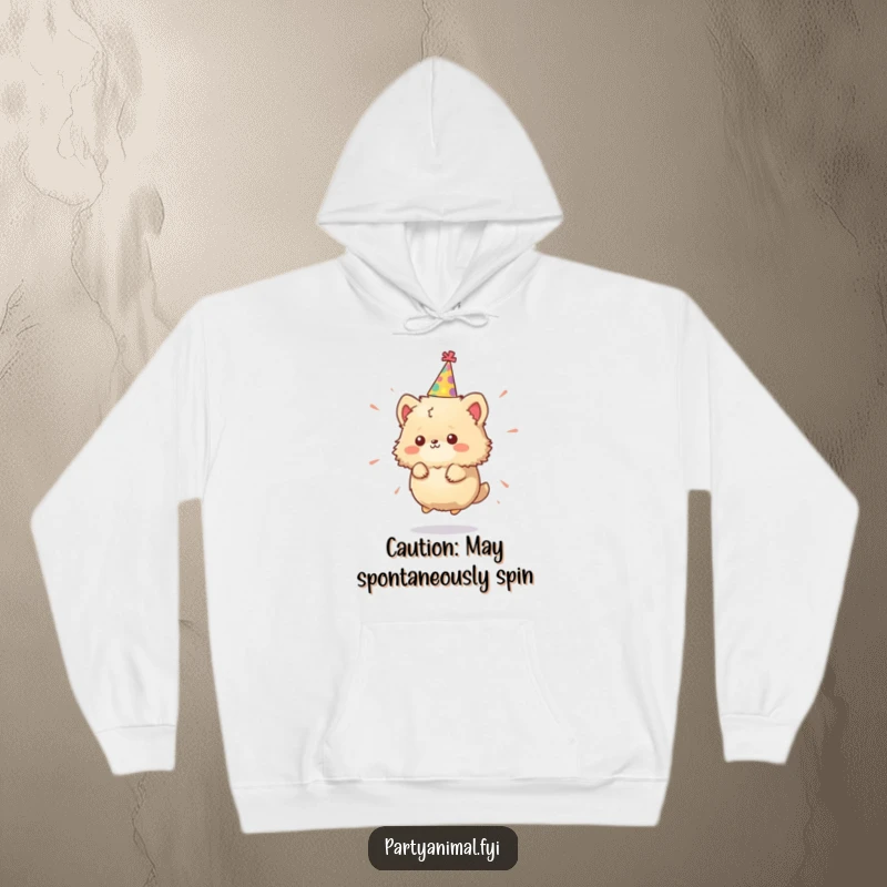 Funny Hoodie: A tiny, fluffy animal character in a party hat spins with ecstatic energy, embodying a fun-filled celebration.