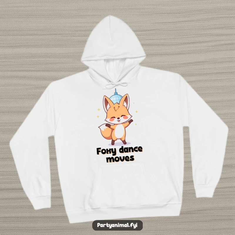 Funny hoodie with a giggling fox character grooving under a sparkling disco mirror ball, offering warmth and fun.