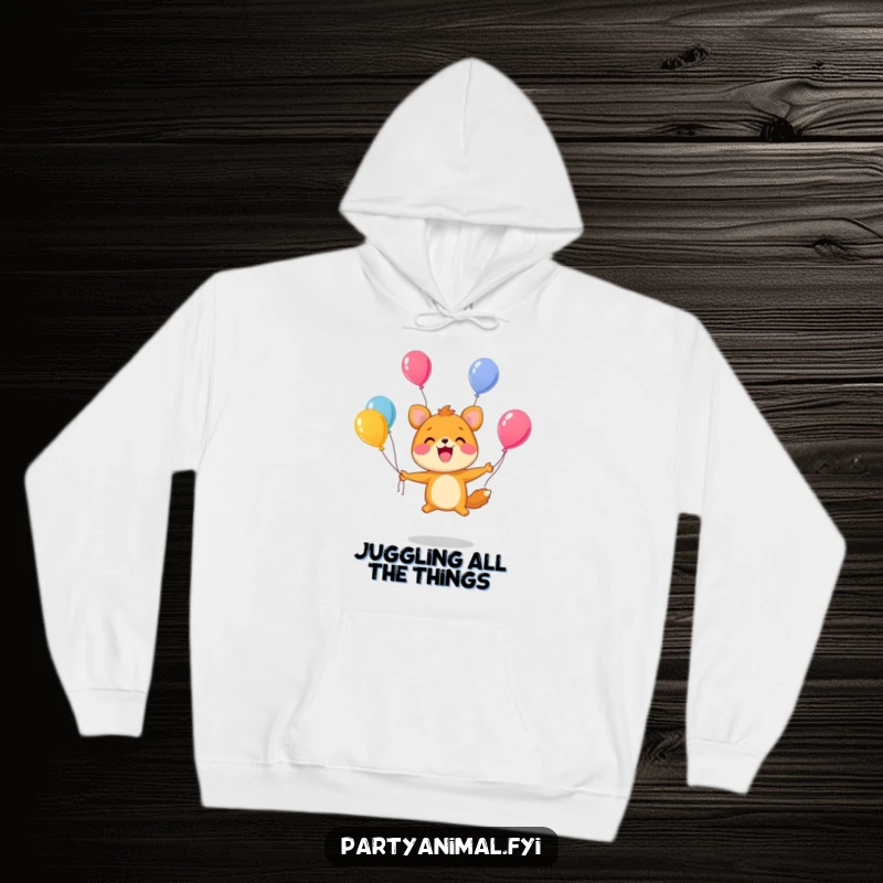 Funny Hoodie: A cute animal character juggles many colorful balloons with a wide, happy smile, embodying pure delight.