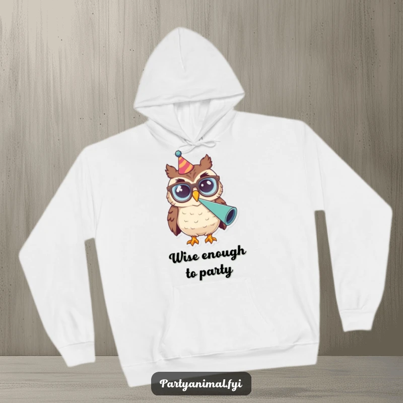 Funny Owl Glasses Party Horn Hoodie: A smiling owl wearing large glasses is depicted blowing a party horn with gusto, a symbol of cozy revelry.
