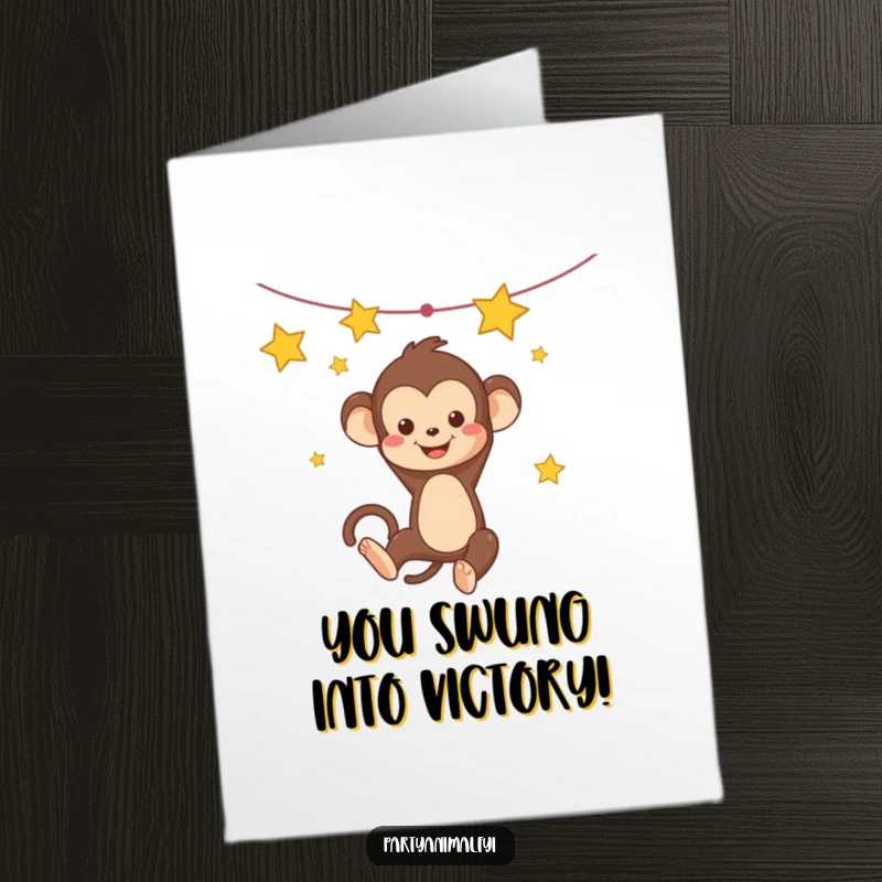 Free Printable congratulations card of a cheerful Kawaii monkey swinging on a star garland, celebrating victory.