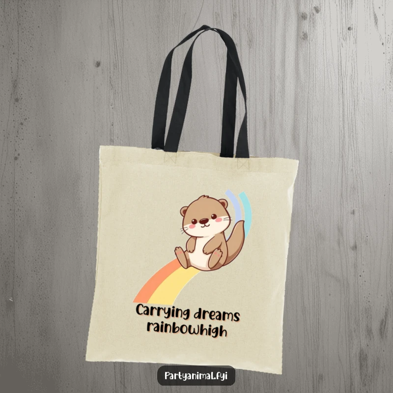 Funny Otter Tote Bag: A happy otter slides down a vivid rainbow crafted from streamers, perfect for carrying essentials with a smile.