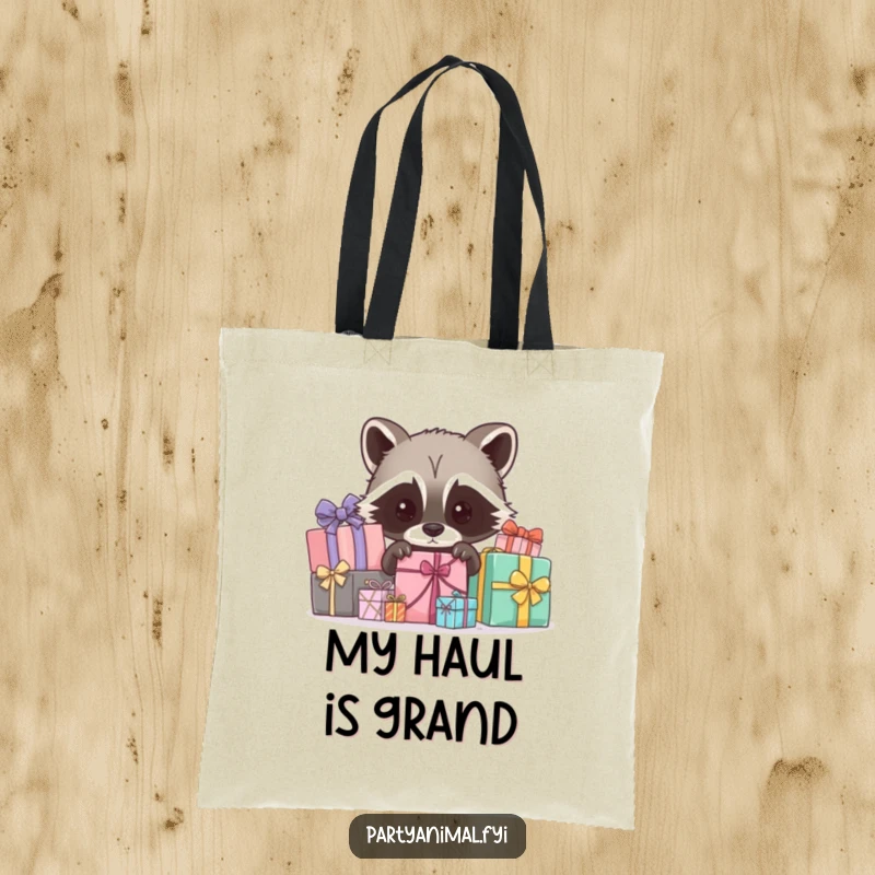 Funny tote bag with a curious raccoon character peeking out from behind wrapped gifts, perfect for carrying essentials with a sly smile.